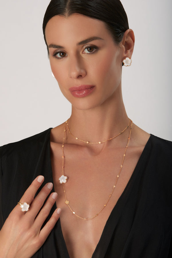 Sautoir, earrings and ring in 18k Rose Gold with MIlky Quartz and Diamonds on model wearing a black t-shirt