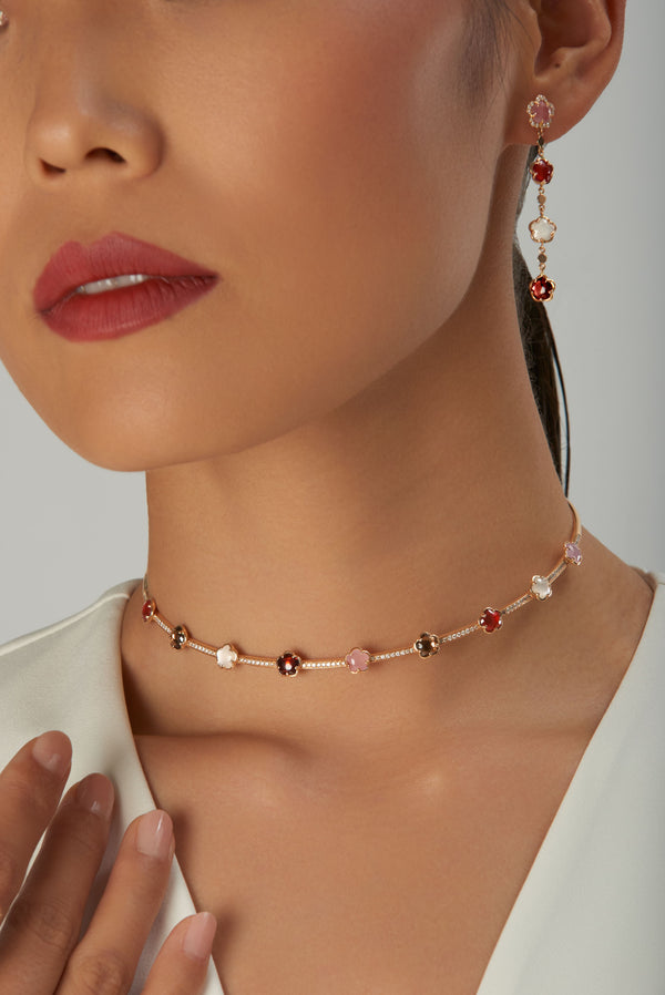 Choker and earring in 18k rose gold with gemstones on model