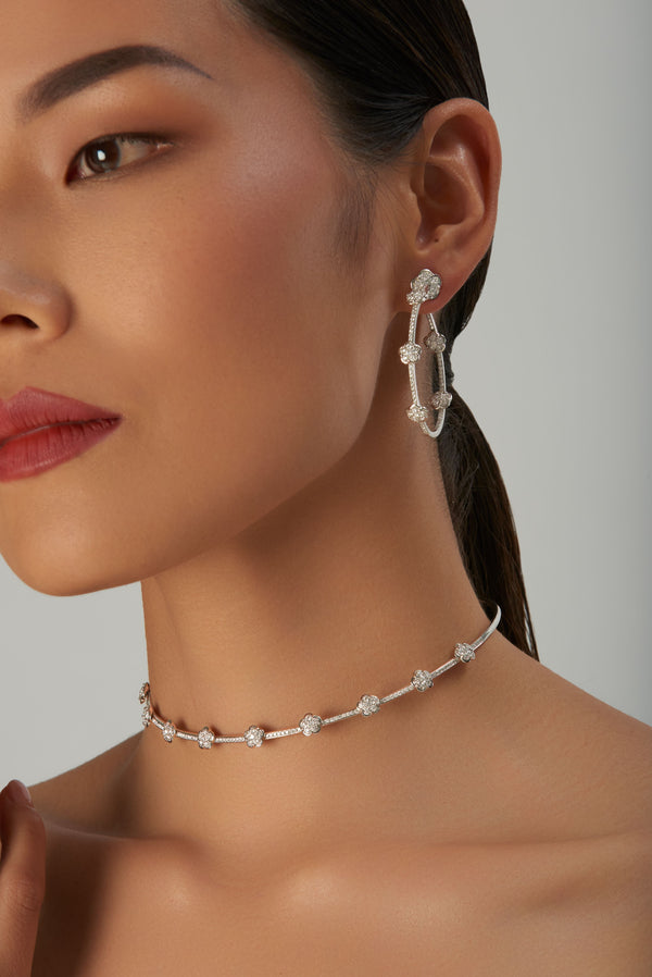 Earrings and choker in 18k white gold with diamonds on model