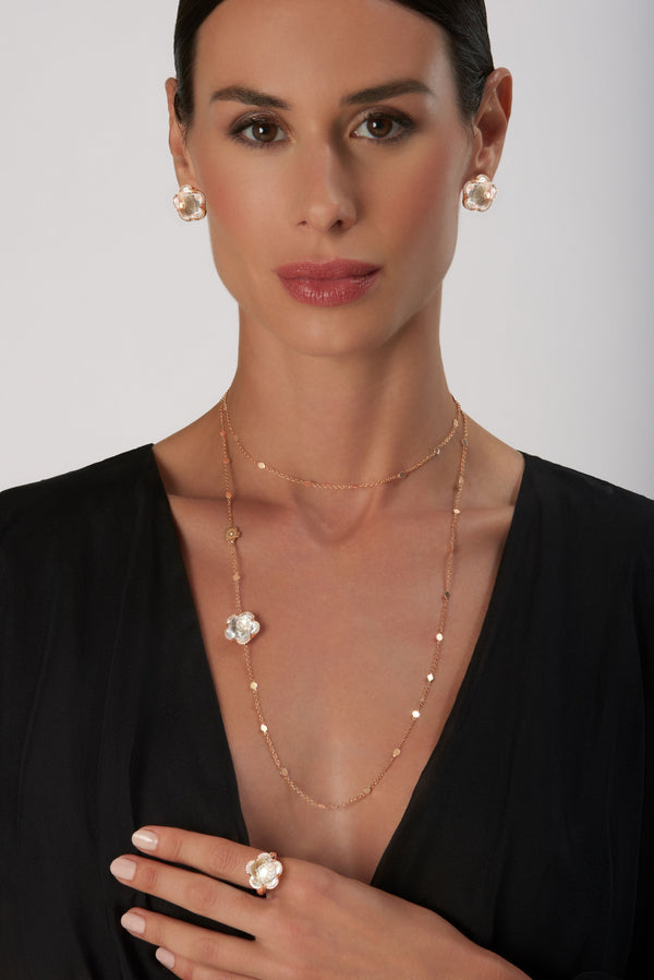 Sautoir, earrings and ring in 18k Rose Gold with Rock Crystal, White and Champagne Diamonds on model wearing black blouse