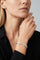 Model wearing a black shirt and a Bracelet in 18k White Gold with White diamonds