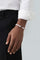 Model wearing a Bracelet in 18k White Gold with White Diamonds and a white shirt and black pants