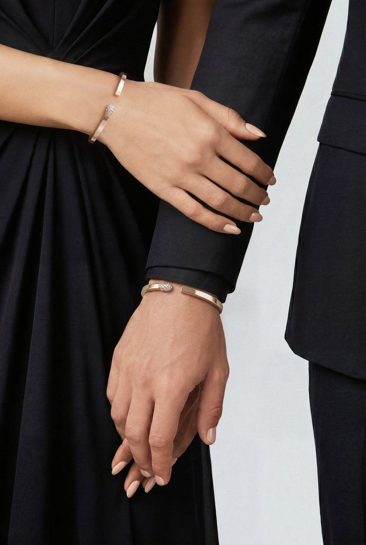 Couple wearing Accendimi Bracelets in 18k Rose Gold with White and Champagne Diamonds