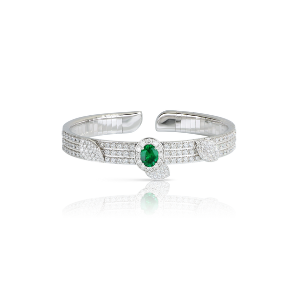 Bracelet in 18k White Gold with oval Emerald 6x8 and Diamonds.