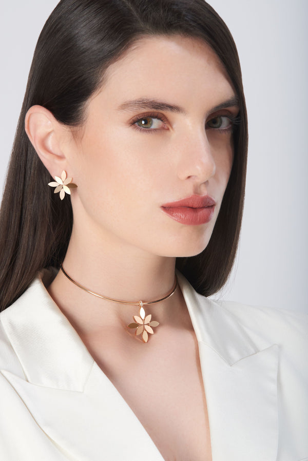 Choker and earrings in 18k Rose Gold on model wearing a white jacket