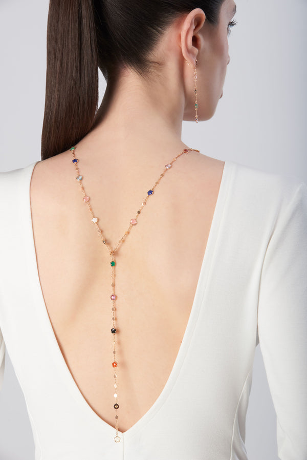 Necklace and pendant earrings in 18k rose gold with gemstones and diamonds on model