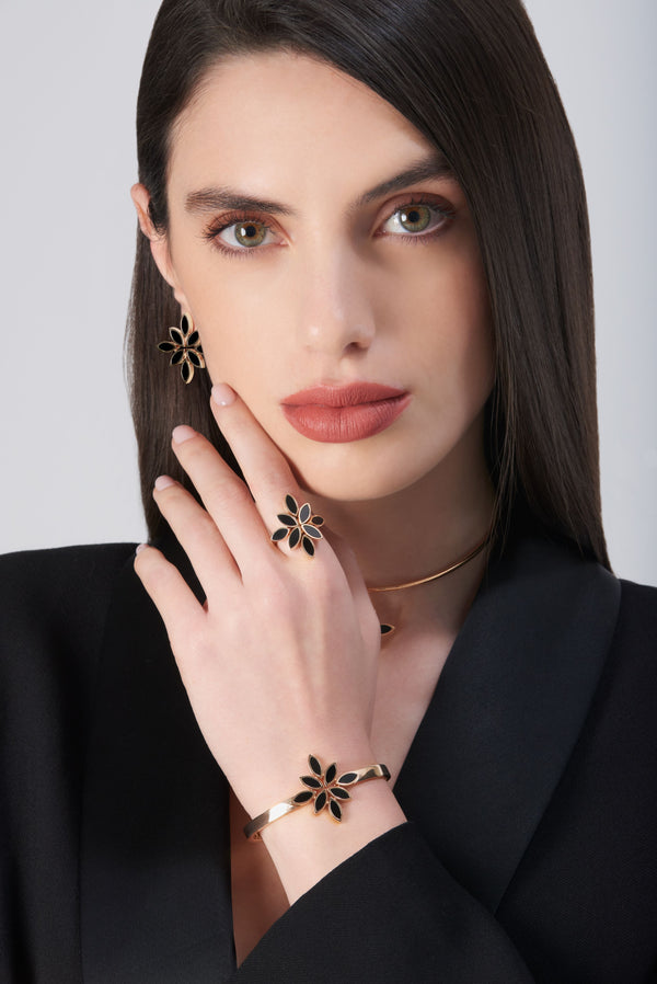Bracelet, earrings, ring in 18k Rose Gold with Onyx on model wearing black dress