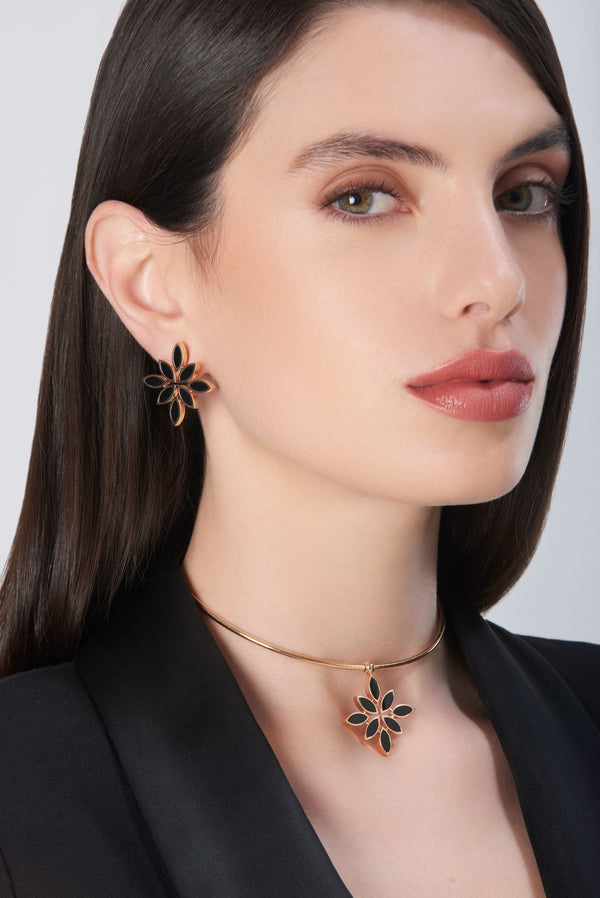 Choker and earrings in 18k rose gold with black onyx on model in black blazer
