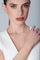 Necklace, ring, bracelet and earrings in 18k Rose Gold with Diamonds on model.