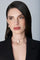 Model wearing a black jacket and earrings and choker in 18k Rose Gold with Diamonds