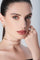 Combination of ring, choker and earrings in 18k Rose Gold with Diamonds, double twist on model wearing a black dress