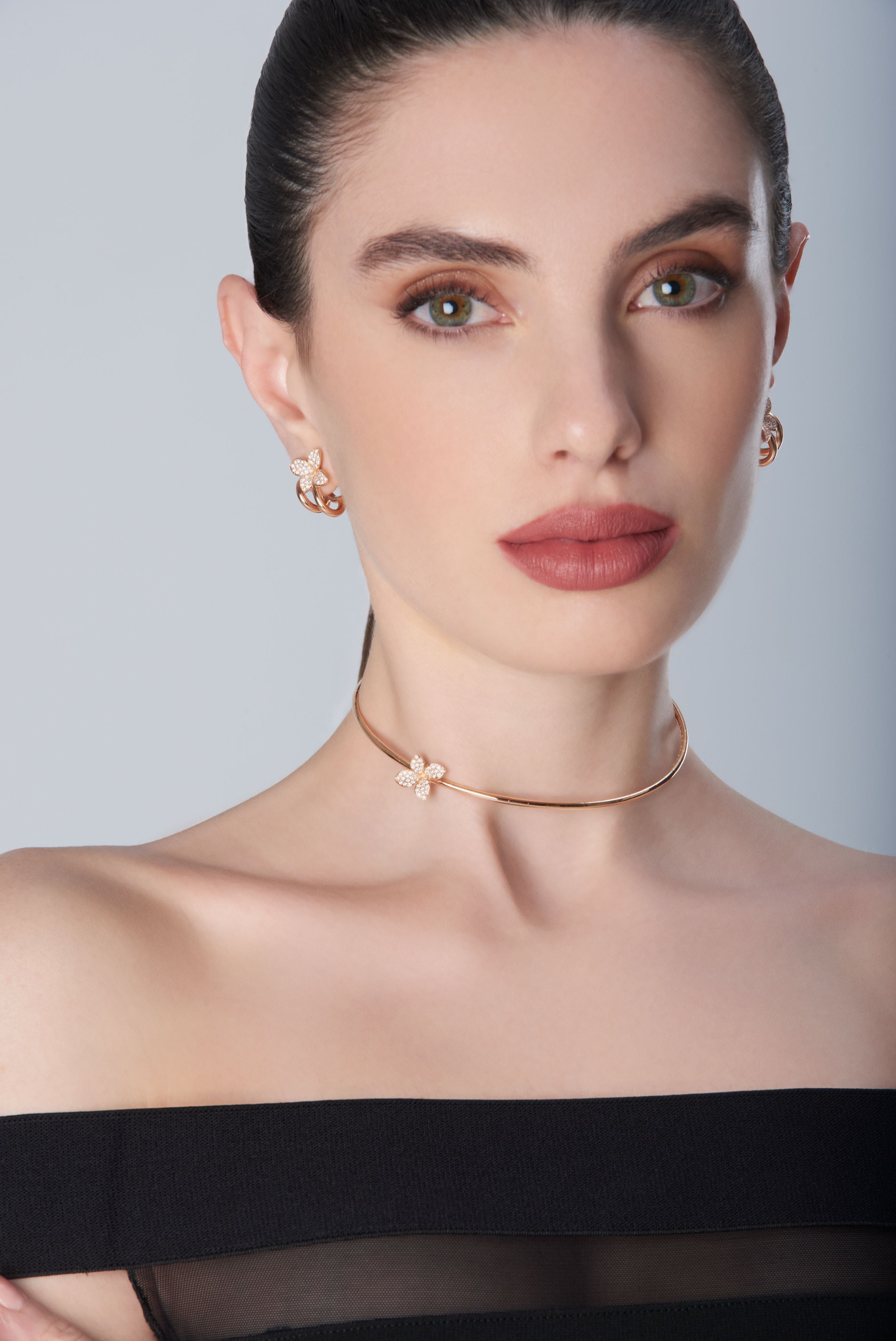 Choker and earrings in 18k Rose Gold with Diamonds on model with black dress