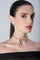 Choker, earrings in 18k Rose Gold with Diamonds on model with black dress