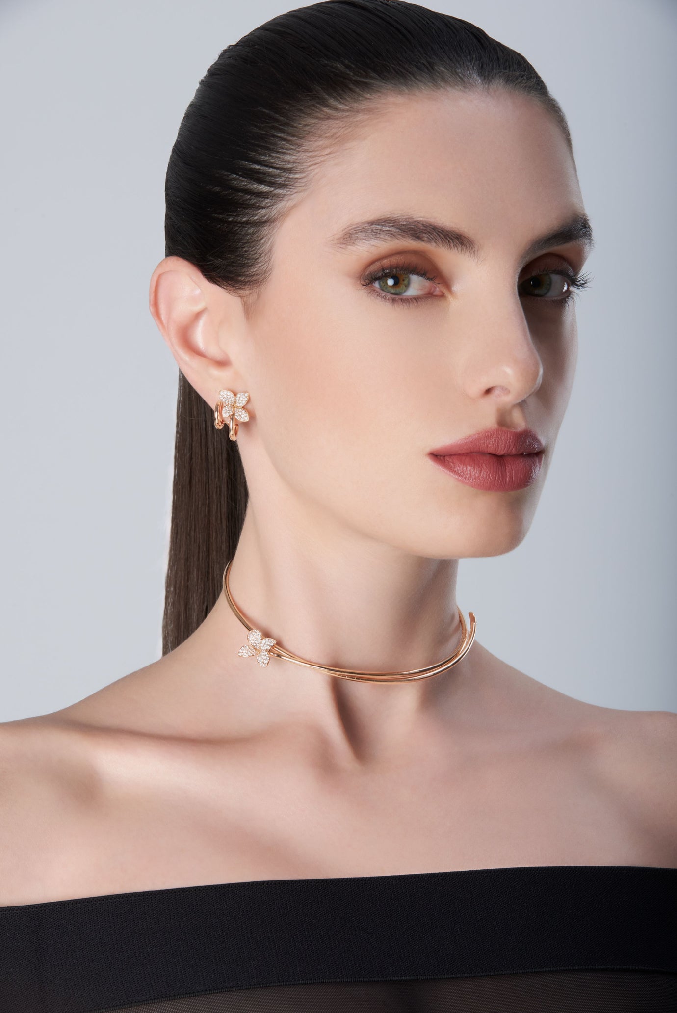 Choker, earrings in 18k Rose Gold with Diamonds on model with black dress