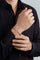 Model wearing a black shirt and Bracelet in 18k Rose Gold and Grey Titanium
