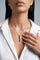 Model wearing a white shirt and Necklace in 18k Rose Gold and Black titanium with white and champagne diamonds