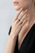Model wearing a Ring in 18k Rose Gold an Black Titanium with White and Champagne Diamonds with a black shirt.