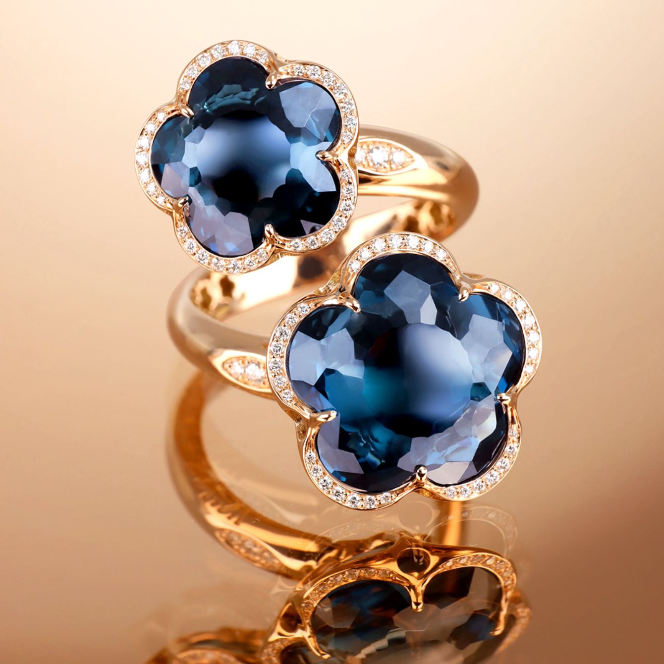 Rings in 18k Rose Gold, blue gemstone and diamonds.