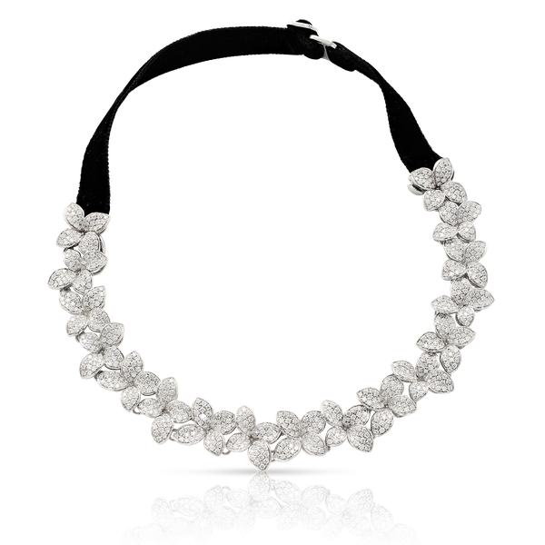 Black velvet necklace with white gold and diamond flower.